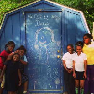 Some of Darah's students remembering her in the ways that they know how.  Taken outside the Darah Farris Memorial Vegetable Garden at the Child-Care Center.